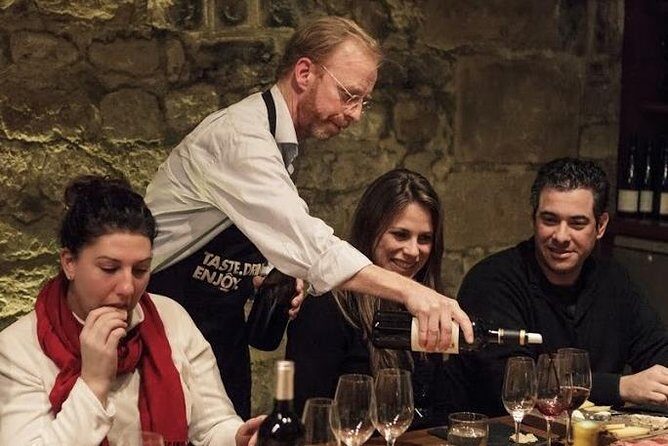 Louvre Masterpieces Express Guided Tour & French Wine Tasting - Louvre Meeting at Arc du Carrousel: Where the Experience Starts