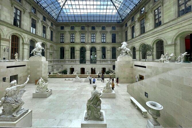 Louvre Museum Timed Entry Ticket with Audio Guide in 4 languages - Timed Entry at the Louvre: What You’re Really Buying
