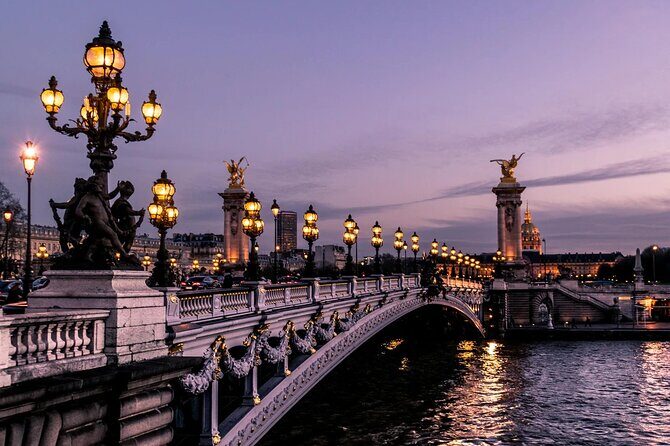 Paris 10-Hour Guided Louvre, Eiffel Tower & Seine River Cruise - Notre-Dame de Paris: a short look, and renovation changes the vibe