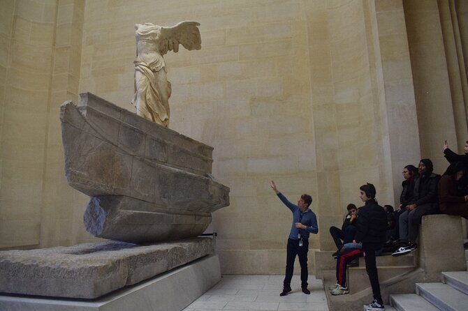 Paris : Louvre Museum Guided Tour with Pre-Booked Tickets - Meeting point at Le Kiosque des noctambules: start with a smooth arrival