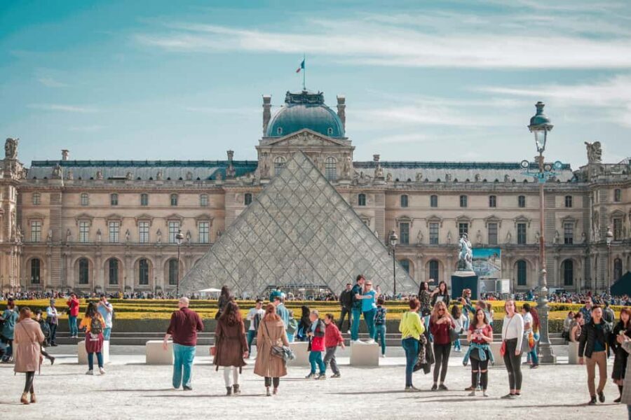 Paris: Louvre Museum Timed Entry Ticket & Pop Culture Tour - Getting started at the Louvre Pyramid: Louis XIV on Horseback